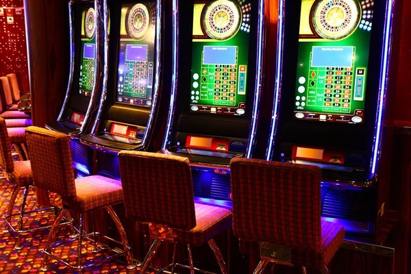 Live blackjack table with dealer and card shoe on multi-camera display